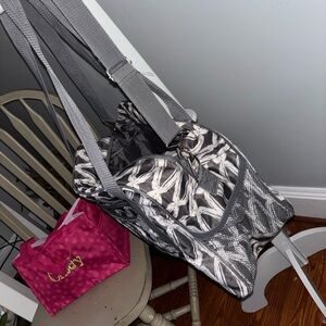 Thirty one. Travel bad & tote. CINDY